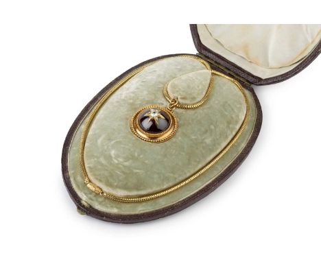 A Victorian garnet and diamond locket pendant on chain, the circular pendant centred with a cabochon garnet in closed-back se