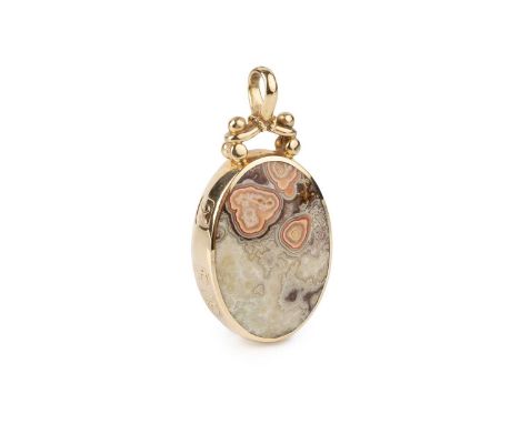 A hardstone pendant by Jack Spencer, inset to both sides with vari-coloured agate panels, the 9ct gold mount with feature hal