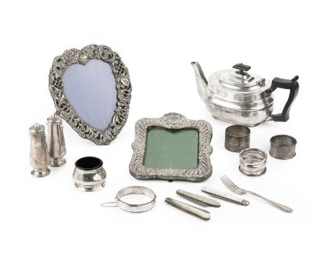 A collection of silver, comprising a teapot with ebonised handle and knop by William Hutton &amp; Sons Ltd, Sheffield 1912, a