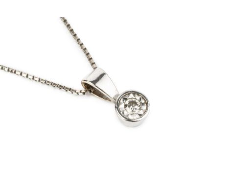 A diamond pendant on chain, the round brilliant-cut diamond in an illusion setting, suspended from a fine box-link chain, 18c