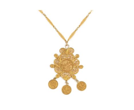 A sovereign set pendant on chain, the filigree pendant with fixed George V sovereign dated 1918, suspending a trio of Ottoman