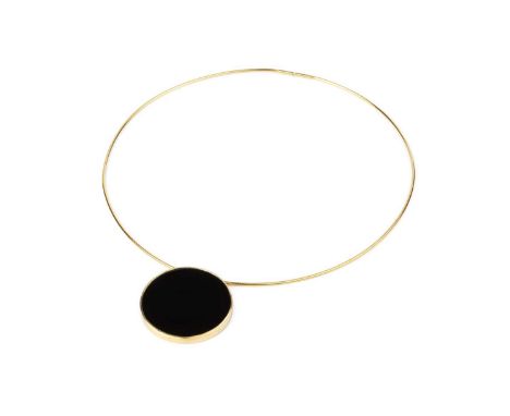 An onyx pendant necklace, the disc-shaped onyx panel in collet setting, 18ct gold mounted, hallmarked for London 2006 with ma