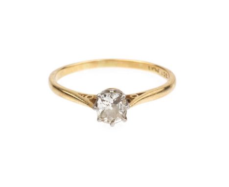 A diamond single stone ring, the cushion-shaped old-cut diamond in claw setting, two colour precious metal mounted, stamped '