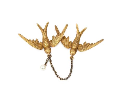 A late Victorian/Edwardian swallows brooch, modelled as two swallows in flight, each with feather textured decoration, suspen