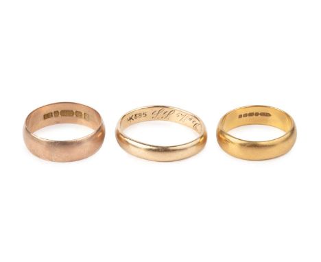 A 22ct gold wedding band, a 9ct gold wedding band, and a further wedding band, with interior inscription, stamped '585', firs