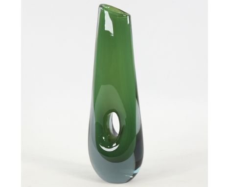 VICKE LINDSTRAND FOR KOSTA, SWEDEN, designed 1953, tall pierced vase in cased green glass, marked to base LH 1321, height 29c