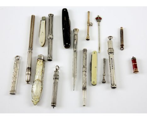 Group of silver propelling pencils and pen knives, including one with red enamel decoration and a mother-of-pearl example, gr