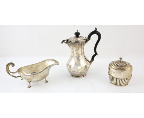 Edward VII silver coffee pot of baluster form, by S Glass, Birmingham, 1908, sauce boat and a tea caddy, gross weight 24oz, 7