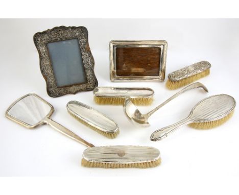 Dutch silver thread pattern soup ladle, by Van Kempen &amp; Son, two photograph frames and various dressing table brushes and