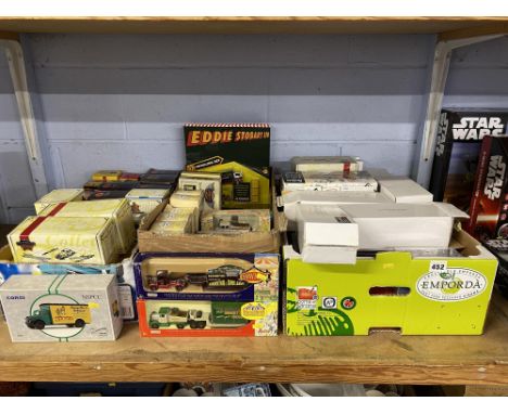 A shelf of boxed diecast, to include Corgi Classic Vehicles, Corgi The Beatles, Eddie Stobart, EFE and Vanguards