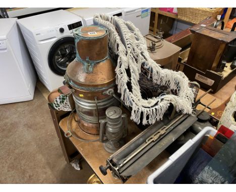 Copper Ship lights, typewriter and a Tilley lamp