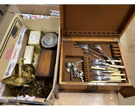 Canteen of cutlery and a box of brassware to include compass, candlestick and a clock