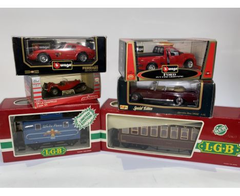 Two LGB Lehmann scale railway models to comprise 3280 passenger coach and a 4065 White Pass wagon and four large scale diecas