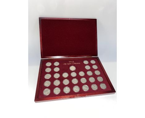 A 2012 50 pence Olympic coin set of 29 coins, to include a completer medallion
