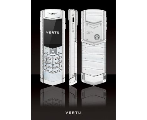 New Old Stock. 100 % genuine phone made by Vertu and Never been used. The back panel of the keyboard is made of a whole piece