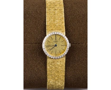 Bracelet Watch, Circa 1970s, Manual winding jewelled movement, 24mm Textured dial, Circular case with diamond set bezel, Dial