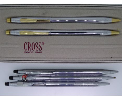 CROSS - Vintage Polished Chrome Cross Classic Century Medallist ballpoint pen and pencil set, both with gold trim. In origina