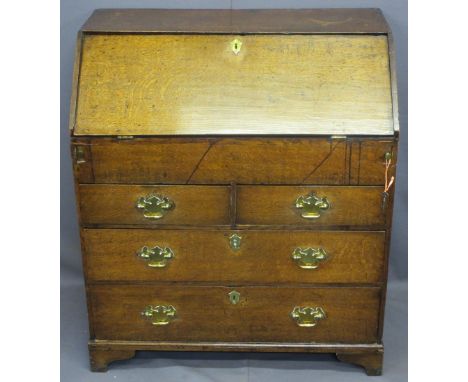 CIRCA 1770 OAK FALL-FRONT BUREAU with interior slide well and architectural style drawers and pigeon holes having various sec