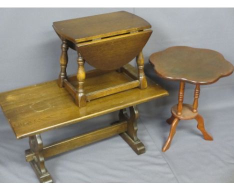 THREE REPRODUCTION OCCASIONAL TABLES including a refectory style rectangular top coffee table, 90cms L, a twin-flap occasiona