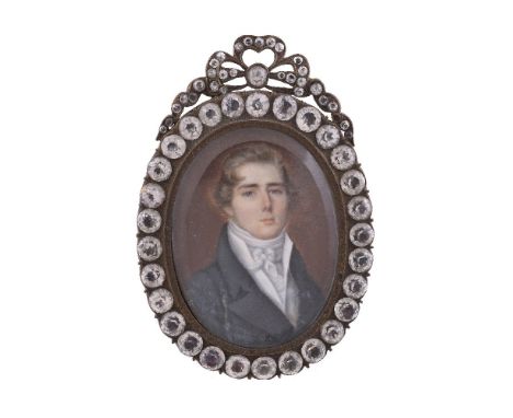 ϒFrench School, circa 1820, portrait of a gentleman wearing a blue coat, watercolour on ivory, 5.2cm x 4cm, oval, in a paste 