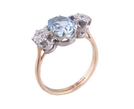 An aquamarine and diamond ring, the oval cut aquamarine claw set between old cut diamonds, stamped plat and 18ct, finger size