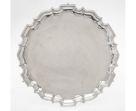 A late Victorian silver shaped circular salver by Thomas Bradbury &amp; Sons, London 1900, retailed by Birch &amp; Gaydon, wi