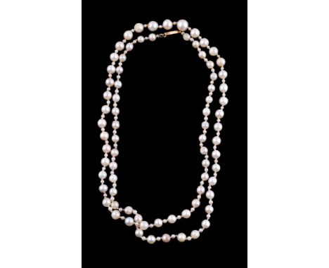 A single row cultured pearl necklace, composed of graduating 5mm to 8mm cultured pearls, with seed pearls in between, to the 