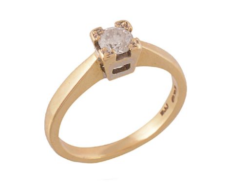 A single stone diamond ring, the brilliant cut diamond in a four claw setting, estimated to weigh 0.22 carats, the shank stam