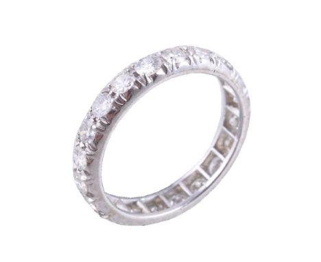 A diamond eternity ring, set with brilliant cut diamonds, approximately 1.10 carats total, finger size L 1/2, 2.7g
