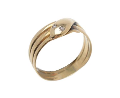 A Victorian 18 carat gold serpent ring, the coiled serpent with rose cut diamond eyes, hallmarked London 1885 and makers mark