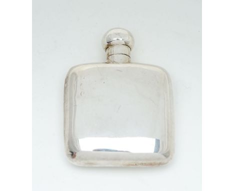 A silver rounded rectangular small spirit flask by Cohen &amp; Charles, Chester 1925, with a screw-off rounded cover and plai