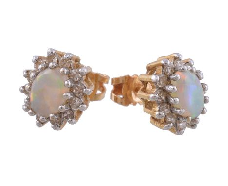 A pair of opal and diamond cluster earrings, the oval cabochon opal claw set within a surround of eight cut diamonds, approxi