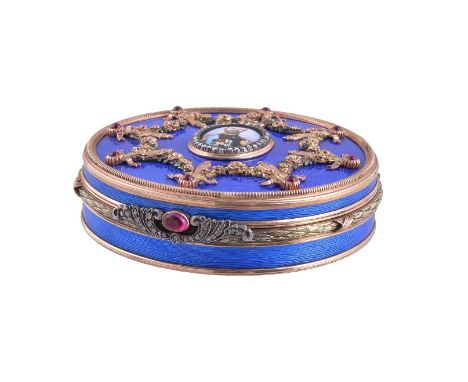 A Continental gold coloured, enamel and gem set circular box, bearing pseudo Russian hallmarks including that of Fabergé, sec