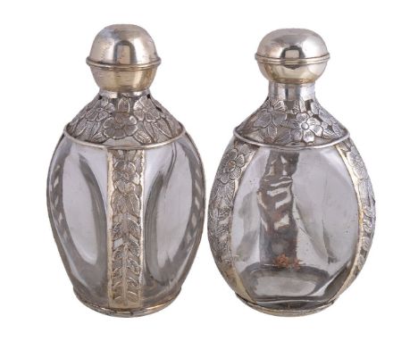 A pair of Mexican silver coloured and glass decanters, stamped Sterling 925 Mexico, 20th century, reusing old Dimple whisky b