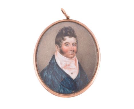 ϒEnglish School, circa 1825, portrait of a gentleman wearing a blue coat, watercolour on ivory, 6.5cm x 5.3cm, oval, in a gil