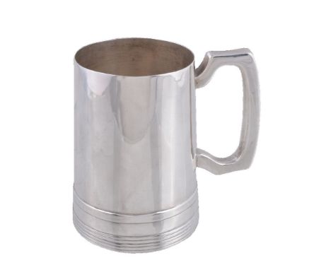 A silver straight-tapered christening mug by Walker &amp; Hall, Sheffield 1939, with an angular D-shape handle, on a threaded