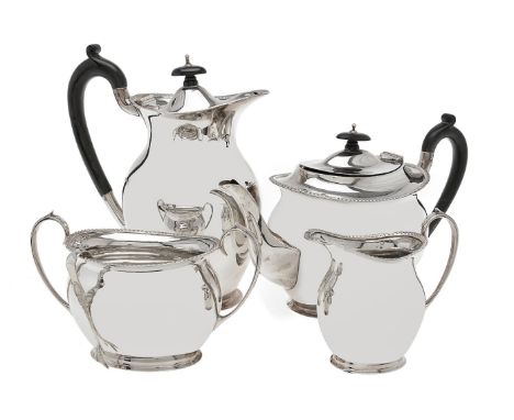 A silver oval baluster four piece tea service by Atkin Brothers, Sheffield 1919 (3) and 1933 (1), the tea and hot water pots 