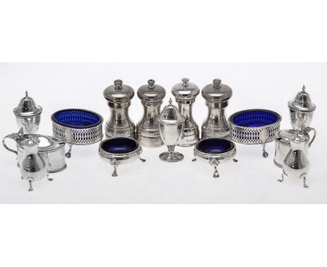 A collection of silver cruet items, comprising: a pair of pierced oval salt cellars by Philip Freeman, London 1773 (one unmar