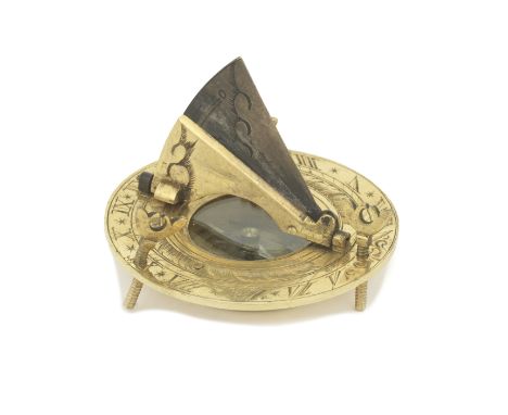 A gilt brass and silver portable sundial, probably German, mid-18th century,the circular dial with inset silvered compass ros