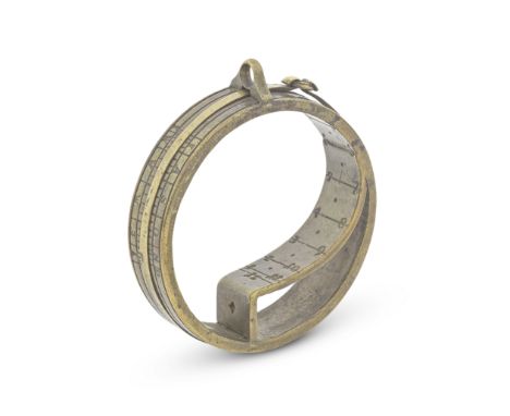 A brass altitude ring dial, probably German, late 16th century,the circular ring with sliding gnomon band, suspension loop an