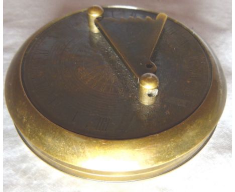 Handheld brass compass and sundial with screw lid