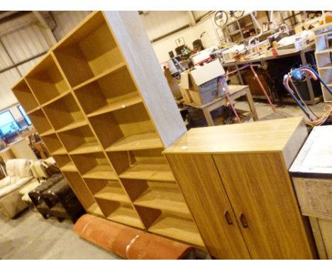 Shelved cupboard and three 2 metre tall light oak bookcases
