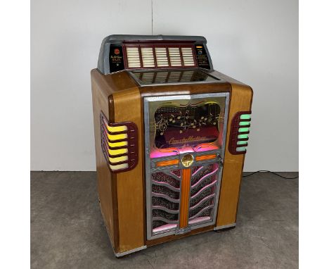 1951 Evans Mills Constellation Model 135 jukebox. 40 selections of 45 RPM records. In late 1948 Evans acquired the Mills phon