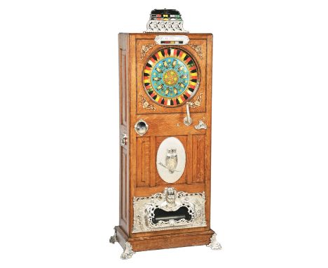 Mills Owl Mechanical Upright Cabinet Musical Slot Machine ca. 1897. This musical floor model machine features a nice oak cabi