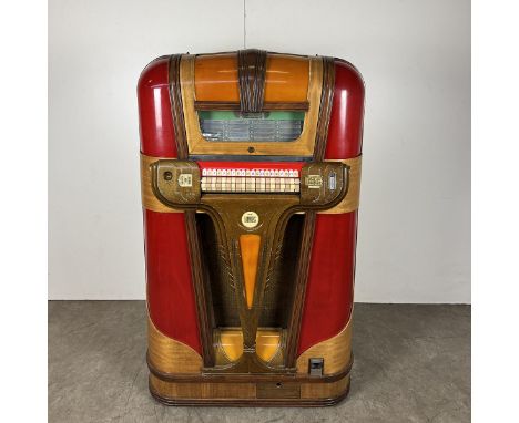 Mills Empress jukebox in red and yellow colorway, 1940-1941. 20 selections of 78 RPM records. Visual condition: excellent con