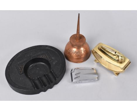 A Coalbrookdale Cast Iron Ashtray, a Table Lighter, Pocket Lighter and a Copper Oil Can, (We Cannot Post This Lot)
