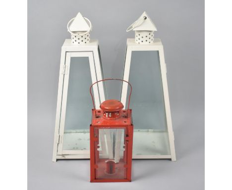 A Pair of White Painted Modern Lanterns and a Red Painted Candle Lantern, Tallest 40cms High