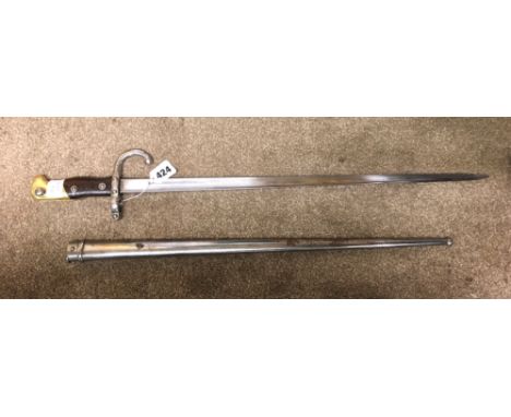 FRENCH BAYONET AND SCABBARD TOP OF BLADE ETCHED ST ETIENNE MARCH 1879 LENGTH OVERALL 53CM 