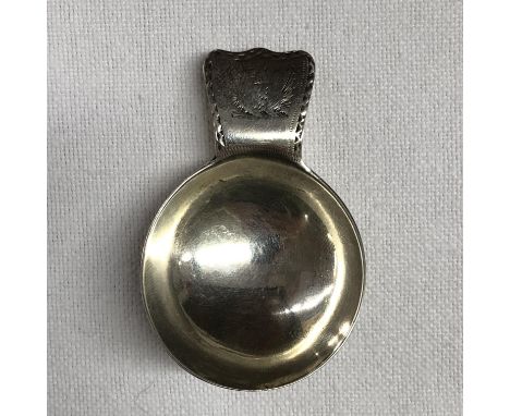 SILVER CADDY SPOON WITH BRIGHT CUT DECORATION AND ARMORIAL