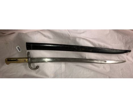 FRENCH BAYONET AND SCABBARD TOP OF BLADE ETCHED 1868 LENGTH OVERALL 57CM 